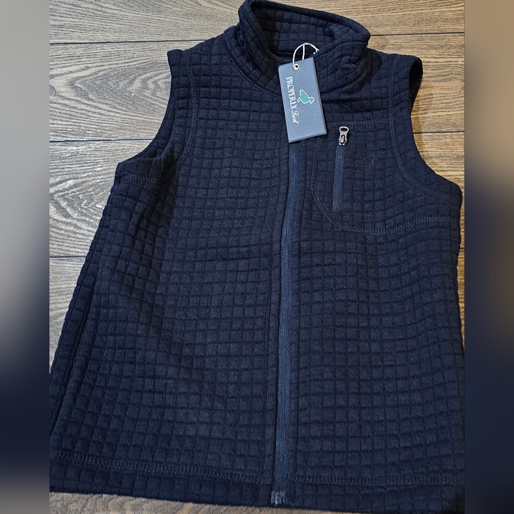New properly tied vest  sizes